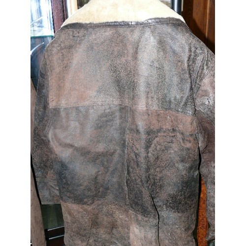 296 - A LEATHER AND SUEDE JACKET BY CARLO SANTINI, NO SIZE GIVEN.