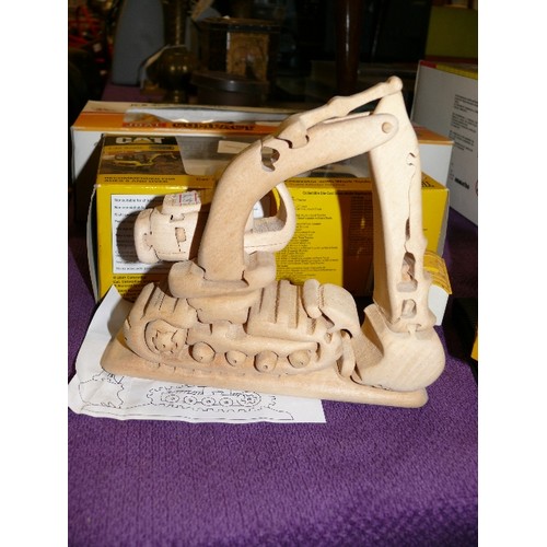 229 - A WOODEN 3D JIGSAW OF AN EXCAVATOR.