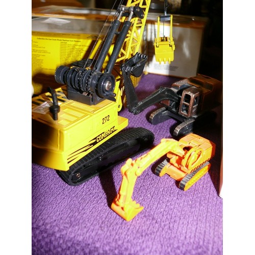 228 - A DIE CAST TOY CRANE BY JOAL PLUS A FURTHER TWO TOY CRANES AND A WORKMAN'S CARRIAGE.