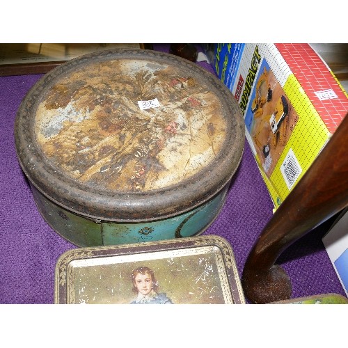 232 - A COLLECTION OF VINTAGE TINS.