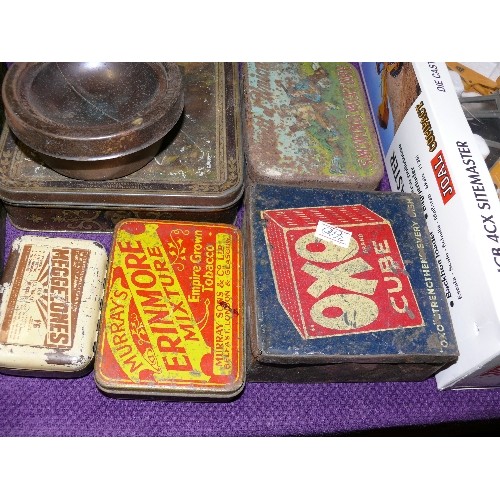 232 - A COLLECTION OF VINTAGE TINS.