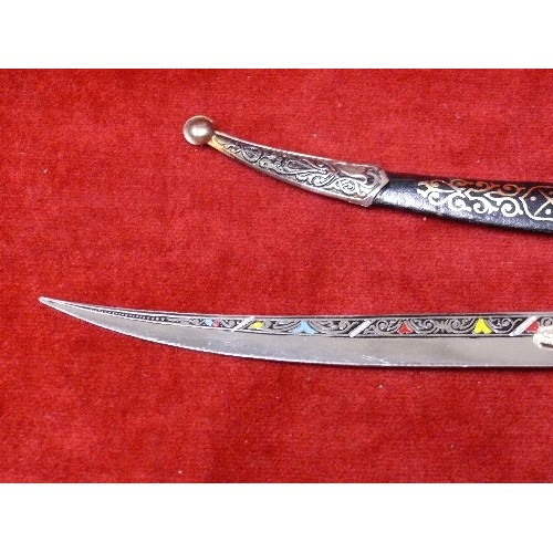 17 - AN ORNAMENTAL DAGGER