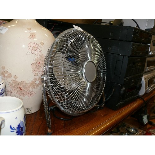 307 - A CHROME TABLE TOP DESK FAN.