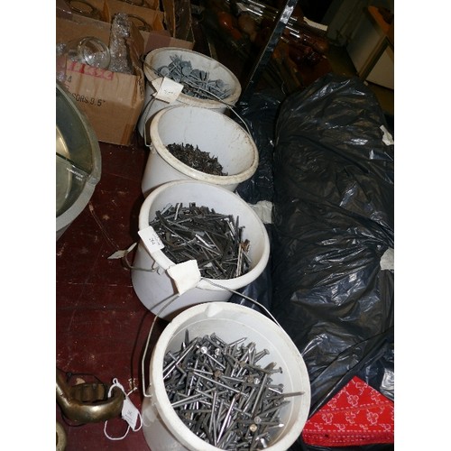 264 - FOUR TUBS OF VARIOUS NAILS.