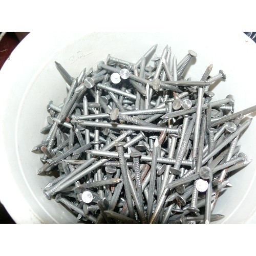 264 - FOUR TUBS OF VARIOUS NAILS.