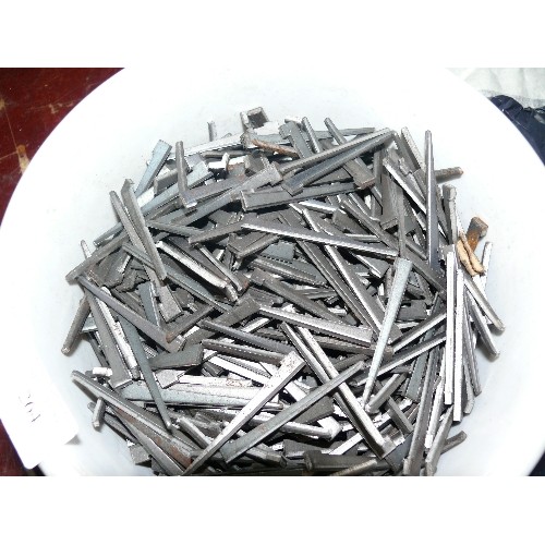 264 - FOUR TUBS OF VARIOUS NAILS.