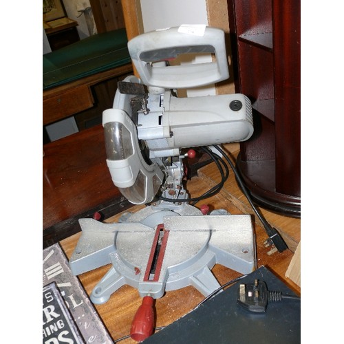 379 - A COMPOUND MITRE SAW/CHOP SAW PCMS210L.