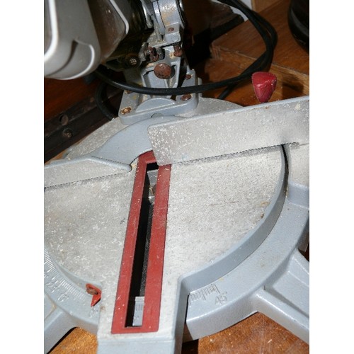 379 - A COMPOUND MITRE SAW/CHOP SAW PCMS210L.