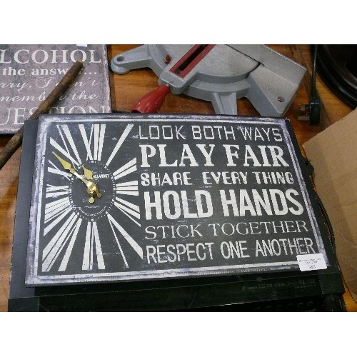 383 - SEVEN TIN CLOCKS WITH QUIRKY MOTTOS.