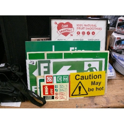 393 - QUANTITY OF SIGNAGE -  FIRE EXITS, CAUTION, EXTINGUISHER SIGNS AND THREE FRAMED RESTAURANT SIGNS.