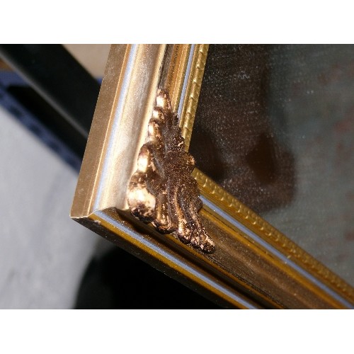 422 - GILT FRAMED MIRROR WITH ART NOUVEAU STYLE CORNERS.