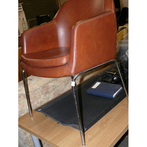 334A - STYLISH TAN FAUX LEATHER CHAIR ON CHROME LEGS.