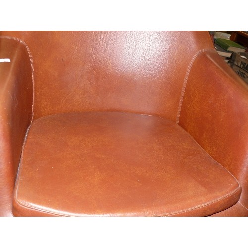 334A - STYLISH TAN FAUX LEATHER CHAIR ON CHROME LEGS.