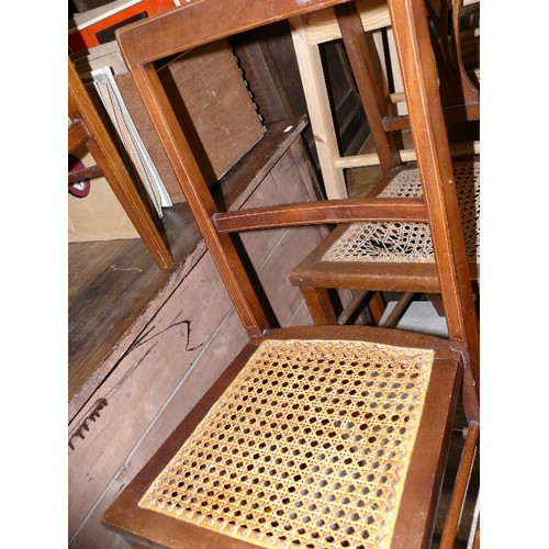 450 - FOUR ART NOUVEAU BISTRO CHAIRS WITH CANE SEWED SEAT NEEDING REPAIR.  TWO DIFFERENT BACKED PAIRS.