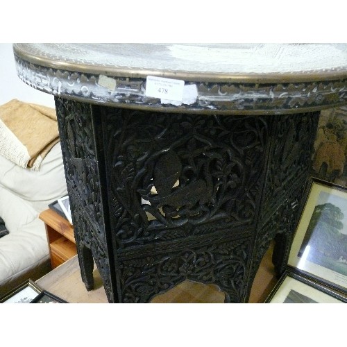 478 - INDIAN CARVED AND PIERCED FOLDING TABLE WITH BRASS TRAY.