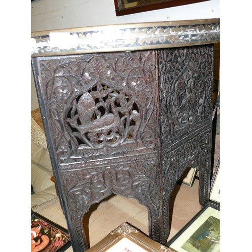 478 - INDIAN CARVED AND PIERCED FOLDING TABLE WITH BRASS TRAY.