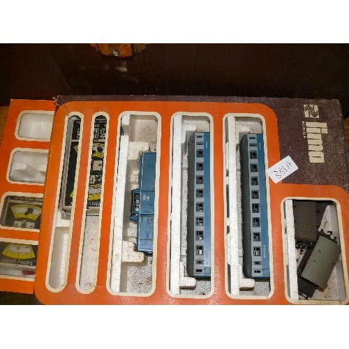 381A - TWO PART TRAIN SETS, TWO LIMA HO SCALE, TWO LOCOS, SOME CARRIAGES ETC.