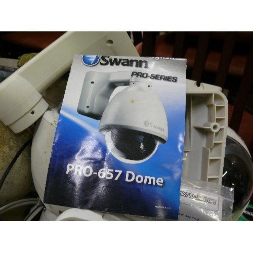 406 - LARGE LOT OF SWAN CCTV CAMERAS, MOVEABLE CAMERAS IN WEATHER GUARDS.