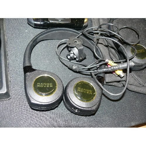 506 - RANGE ROVER BIOGRAPHY - PARCEL SHELF, TWO PAIRS OF RANGE ROVER BRANDED HEADPHONES WITH CONTROLLER, A... 