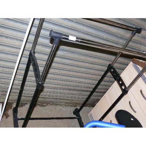 527 - DOUBLE CLOTHES RACK WITH TWIN HANGING RAILS ON CASTORS.