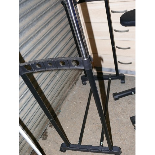 527 - DOUBLE CLOTHES RACK WITH TWIN HANGING RAILS ON CASTORS.