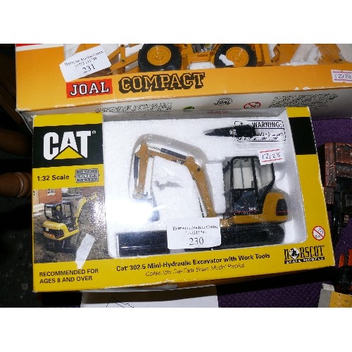 230 - A CAT 302.5 MINI-HYDRAULIC EXCAVATOR WITH WORK TOOLS 1:32 SCALE, BOXED.