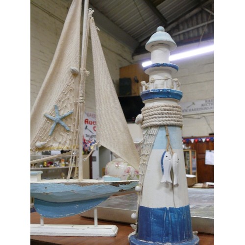 271B - WOODEN YACHT AND A WOODEN  LIGHTHOUSE BOTH IN BLUE AND WHITE.