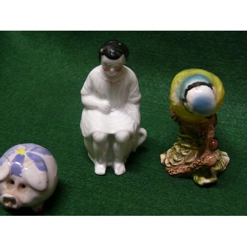 10 - A BESWICK BLUE TIT FIGURE PLUS A COLLECTION OF MINATURE HORSES, A PIG AND A PERSON ON A CHAMBER POT.