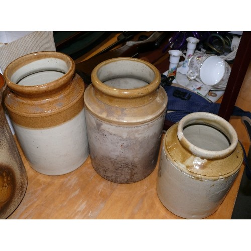 247 - A SET OF THREE SALT GLAZE POTS.