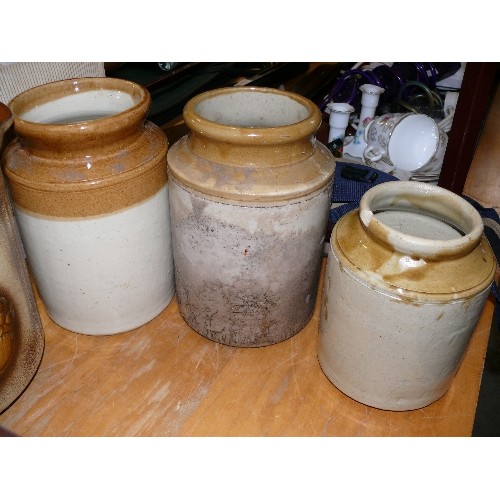 247 - A SET OF THREE SALT GLAZE POTS.