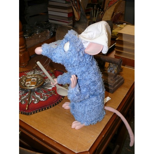 317 - A DISNEY MECHANICAL RATATOUILLE TOY.