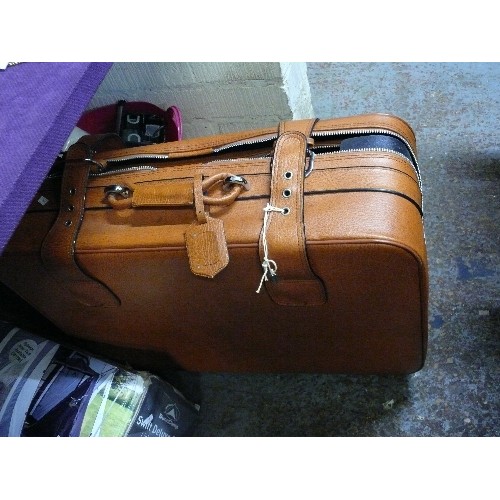 482 - THREE BROWN FAUX LEATHER SUITCASES, STAGGERED SIZES PLUS THREE LOCKS AND KEYS TO TWO.