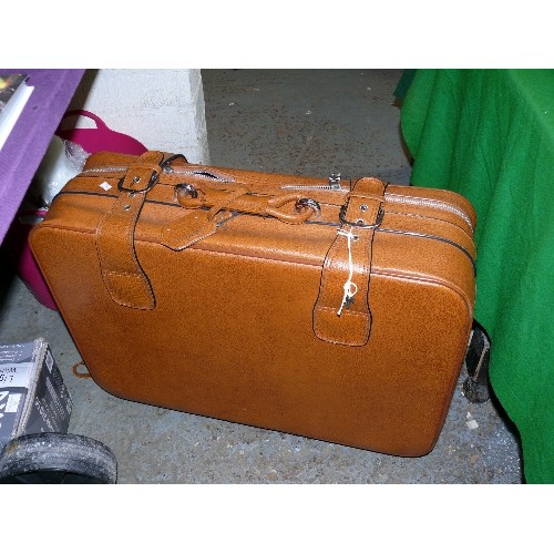 482 - THREE BROWN FAUX LEATHER SUITCASES, STAGGERED SIZES PLUS THREE LOCKS AND KEYS TO TWO.