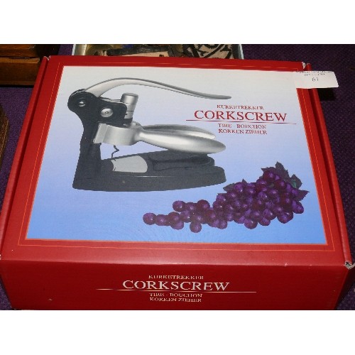 61 - BOXED CORKSCREW SET BY KURKETREKKER AND A BOTTLE STOPPER.