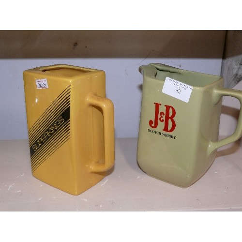 82 - A J & B SCOTCH WHISKY WATER JUG BY WADE AND A SUPERKINGS WATER JUG.