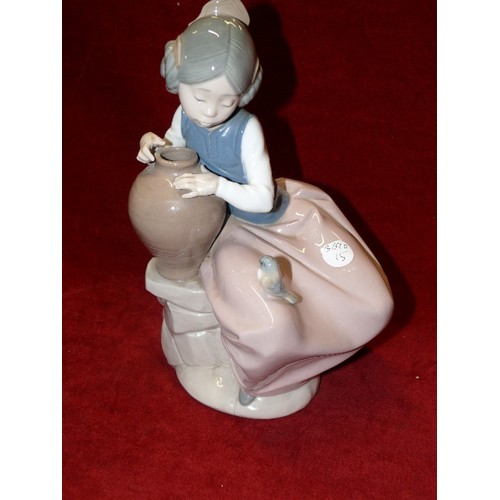 93 - A NAO FIGURINE OF GIRL HOLDING A VASE AND A BIRD ON HER KNEE.