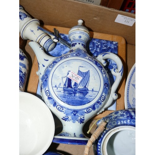 131 - A LARGE BOX OF BLUE AND WHITE DELFTWARE.