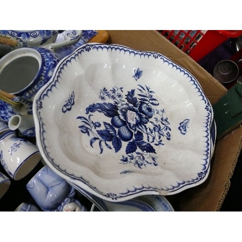 131 - A LARGE BOX OF BLUE AND WHITE DELFTWARE.