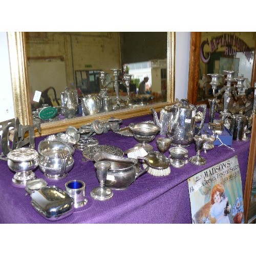 135 - A LARGE SELECTION OF SILVER PLATE ITEMS.