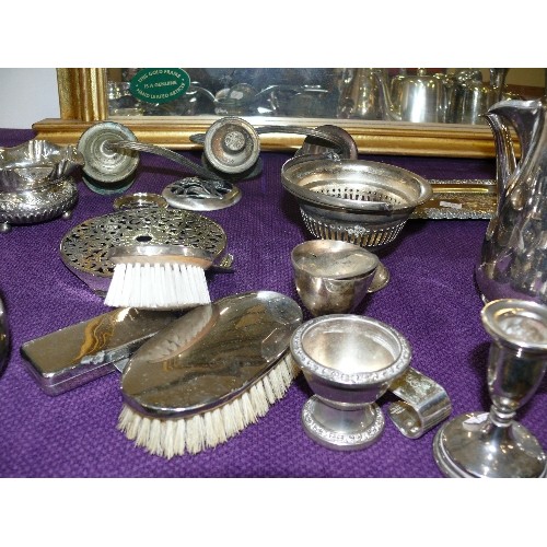 135 - A LARGE SELECTION OF SILVER PLATE ITEMS.