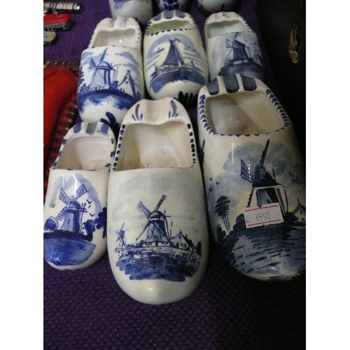 137 - A COLLECTION OF BLUE AND WHITE CERAMIC DELFTWARE CLOGS.