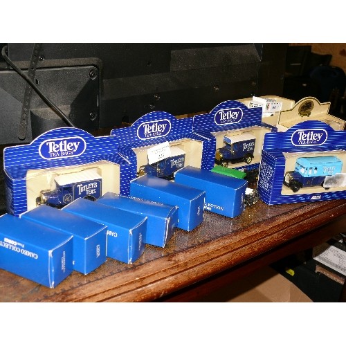 223 - A SELECTION OF BOXED DIE CAST CARS TO INCLUDE TETLEY.