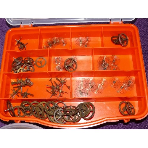 115 - THREE BOXES OF SMALL CLOCK PARTS, BALANCE SPRINGS, BALANCE WHEELS ETC.