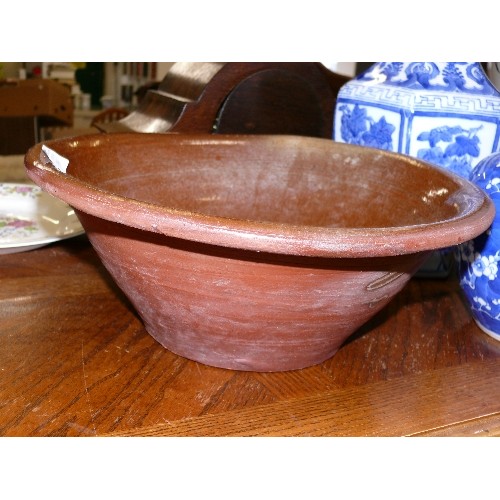 356 - A BROWN GLAZED DAIRY BOWL.