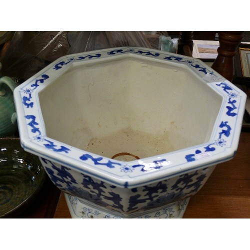351 - LARGE BLUE AND WHITE ORIENTAL OCTAGONAL CERAMIC PLANTER.