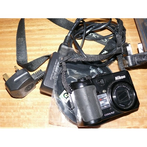 A NIKON COOLPIX P6000 DIGITAL CAMERA WITH BATTERY CHARGER AND