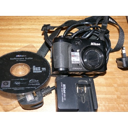 A NIKON COOLPIX P6000 DIGITAL CAMERA WITH BATTERY CHARGER AND