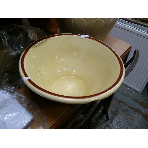 359 - LARGE CREAM DAIRY BOWL WITH A BROWN RIM.