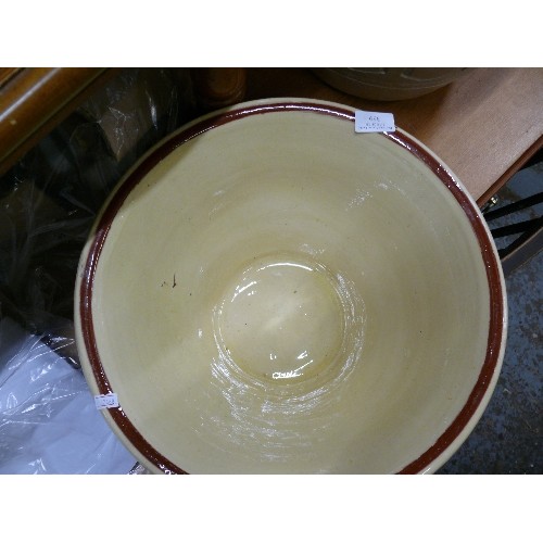 359 - LARGE CREAM DAIRY BOWL WITH A BROWN RIM.
