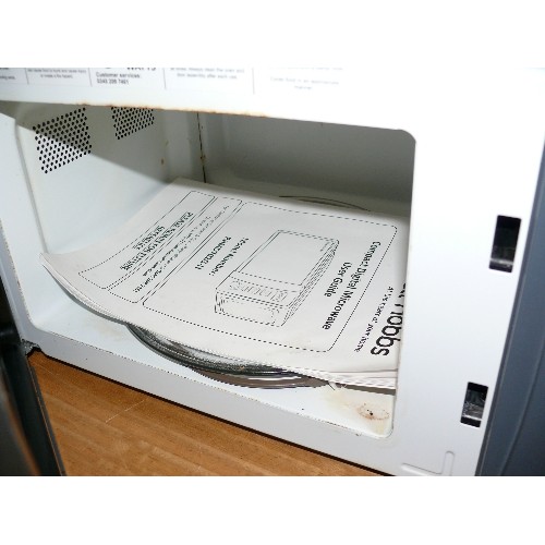 380 - A RUSSEL HOBBS MICROWAVE.